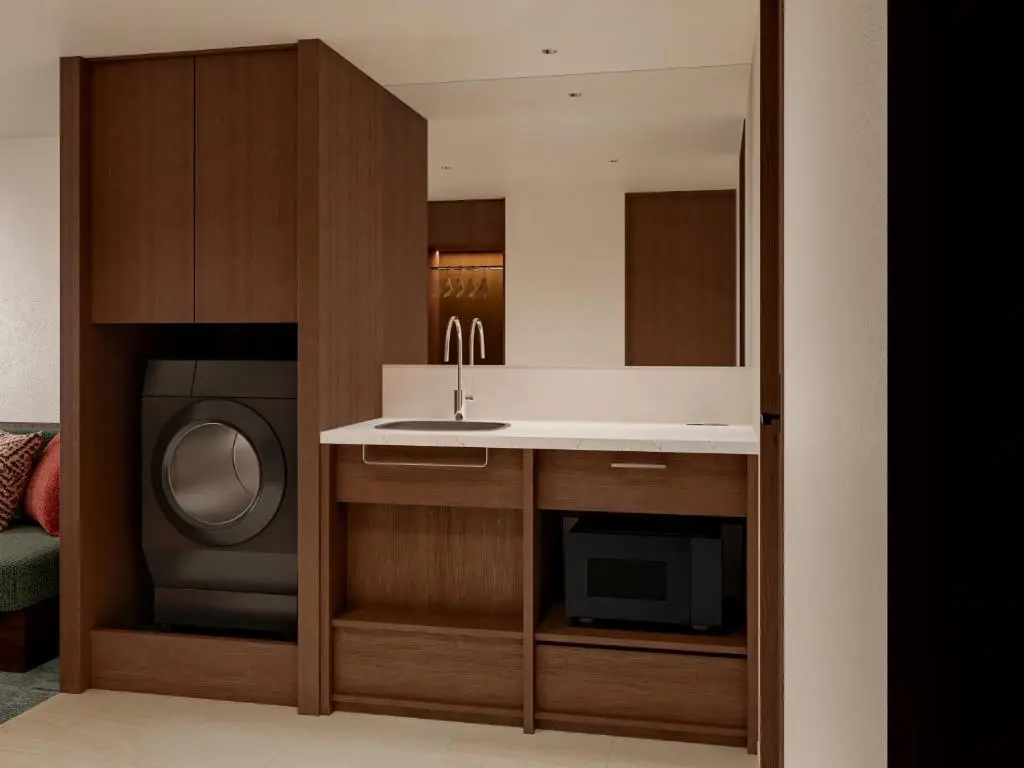 Coin cuisine avec lave-linge séchant et micro-ondes au Tokyu Stay Shinjuku, hôtel pratique à Tokyo en famille